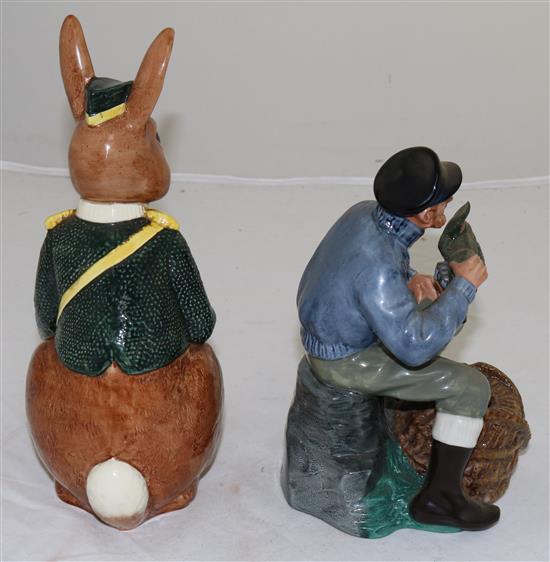 A Royal Doulton Bunnykins bank and a figure The Lobster Man